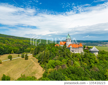 Aerial drone fly near Smolenice castle, Slovakia. Trnava region, Litle Carpathians. Aerial drone fly near Smolenice castle, Slovakia. Trnava region, Litle Carpathians. 135410223