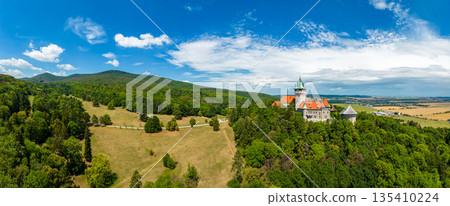 Aerial drone fly near Smolenice castle, Slovakia. Trnava region, Litle Carpathians. Aerial drone fly near Smolenice castle, Slovakia. Trnava region, Litle Carpathians. 135410224