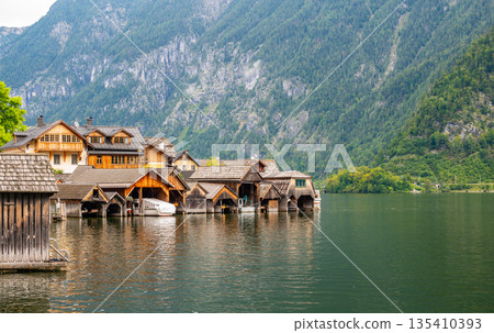 Hallstatt dock at the Hallstatter see lake. Big mountains in background. 135410393