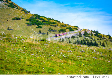 View of Schafberg train and railways. SCHAFBERGBAHN Cog Railway running from St. Wolfgang up the Schafberg, Austria. View of Schafberg train and railways. SCHAFBERGBAHN Cog Railway running from St. Wolfgang up the Schafberg, Austria. 135410437