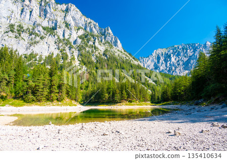 Gruner See, Austria Peaceful mountain view with famous green lake in Styria. Turquoise green color of water. Travel destination 135410634