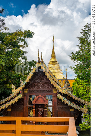 Wat Phra That Doi Suthep, famous golden temple with gold pagoda near the Chiang Mai city, Thailand. Wat Phra That Doi Suthep, famous golden temple with gold pagoda near the Chiang Mai city, Thailand. 135410713