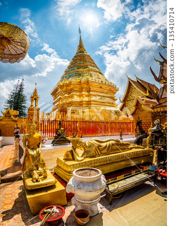 Wat Phra That Doi Suthep, famous golden temple with gold pagoda near the Chiang Mai city, Thailand. Wat Phra That Doi Suthep, famous golden temple with gold pagoda near the Chiang Mai city, Thailand. 135410714