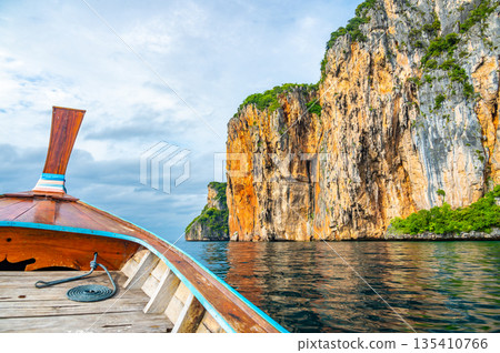 View of limestone rock at Ko Phi Phi islands, Thailand. View from long tailed boat. Exotic and tropic nature, summer paradise. 135410766
