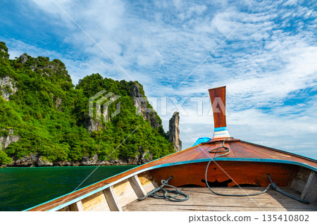 View of limestone rock at Ko Phi Phi islands, Thailand. View from long tailed boat. Exotic and tropic nature, summer paradise. 135410802