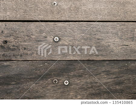 Texture of old wood with screw inside. Dark brown color. Texture of old wood with screw inside. Dark brown color. 135410865