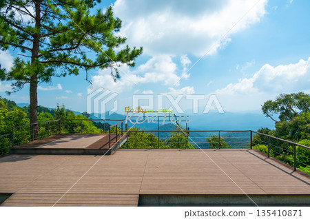 Panoramatic view of Kew Fin viewpoint near the Mae Kampong village and Chiang Mai city, Thailand. View of mountains and hills in sunny day. Panoramatic view of Kew Fin viewpoint near the Mae Kampong village and Chiang Mai city, Thailand. View of mountains and hills in sunny day. 135410871