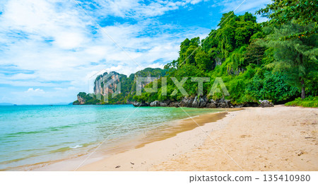 Long tail boats at Railay beach, Krabi, Thailand. Tropical paradise, turquoise water and white sand. 135410980