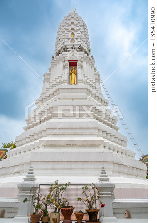 Wat Rakhang Kositaram buddhist temple at Bangkok, Thailand. White temple with pagoda, religion building. 135410990