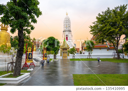 Wat Rakhang Kositaram buddhist temple at Bangkok, Thailand. White temple with pagoda, religion building. 135410995