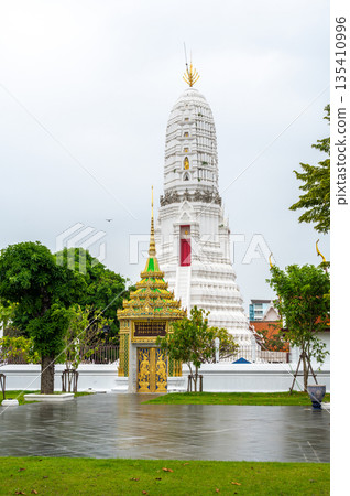 Wat Rakhang Kositaram buddhist temple at Bangkok, Thailand. White temple with pagoda, religion building. 135410996