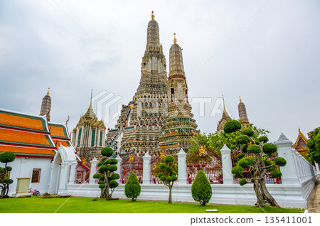 Wat Arun Ratchawararam Ratchawaramahawihan temple at Bangkok, Thailand. Buddhist temple, famous tourist destination. 135411001
