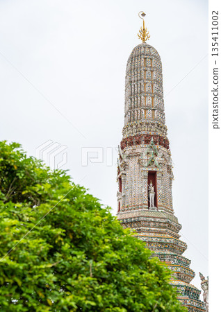 Wat Arun Ratchawararam Ratchawaramahawihan temple at Bangkok, Thailand. Buddhist temple, famous tourist destination. 135411002