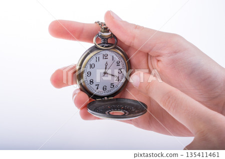 Pocket watch in hand 135411461