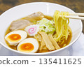 Chopstick-lifting soy sauce ramen 135411625