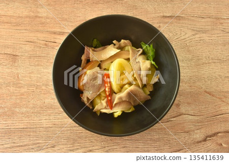 stir fried pickled cabbage with slice pork stomach and chili on bowl stir fried pickled cabbage with slice pork stomach and chili on bowl 135411639