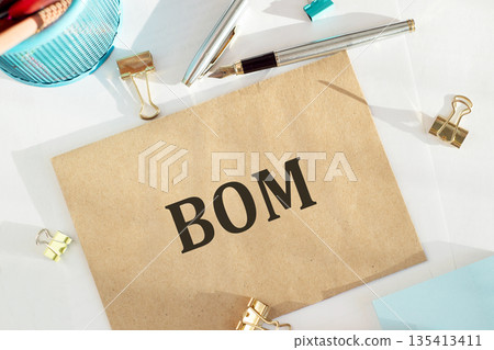 BOM - Bill Of Materials acronym on notepad, business concept background BOM - Bill Of Materials acronym on notepad, business concept background 135413411