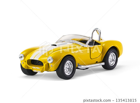 Miniature yellow toy racing car on white background 135413815