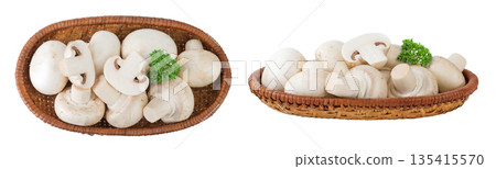 Fresh mushroom champignon in a wicker basket isolated on white background. Top view. Flat lay. 135415570