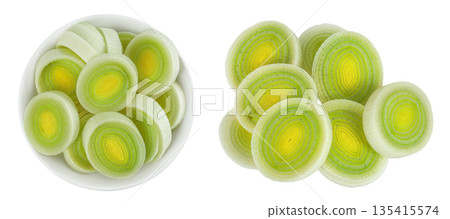 sliced Leek vegetable in ceramic bowl isolated on white background. Top view. Flat lay 135415574