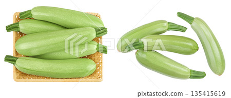 zucchini or marrow in a wicker basket isolated on white background with full depth of field. Top view. Flat lay zucchini or marrow in a wicker basket isolated on white background with full depth of field. Top view. Flat lay 135415619