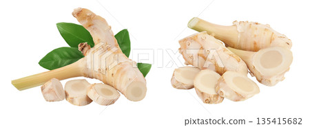 Fresh galangal root with slices isolated on white background with full depth of field. Fresh galangal root with slices isolated on white background with full depth of field. 135415682
