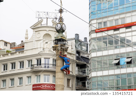 Spiderman statue climbing a clock tower in La Coruna Spain Spiderman statue climbing a clock tower in La Coruna Spain 135415721