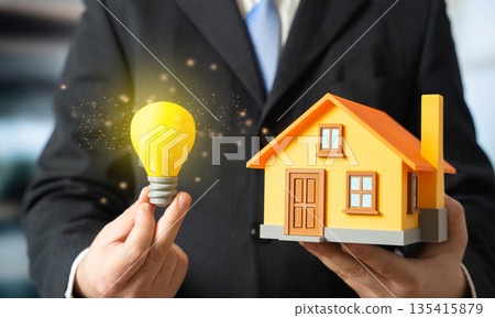 A house and a burning light bulb. Smart home. Electricity and autonomy. Energy efficient living, connected home systems and backup power solutions. Digital comfort, smart technology 135415879
