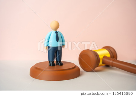 An office worker and the judge's hammer. Protecting workers' rights. Dismissal under the law. Labor regulation, legal compliance and balance between employer authority and employee protection An office worker and the judge's hammer. Protecting workers' rights. Dismissal under the law. Labor regulation, legal compliance and balance between employer authority and employee protection 135415890
