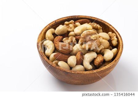 Mixed nuts in a wooden bowl 135416044