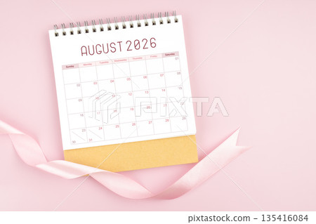 August 2026 desk calendar with pink pastel ribbon. August 2026 desk calendar with pink pastel ribbon. 135416084