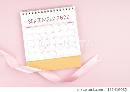 September 2026 desk calendar with pink pastel ribbon. September 2026 desk calendar with pink pastel ribbon. 135416085