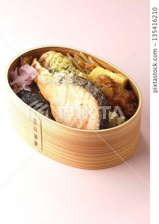 Chikuwa tempura, fried chicken, grilled salmon, and nori bento Chikuwa tempura, fried chicken, grilled salmon, and nori bento 135416210