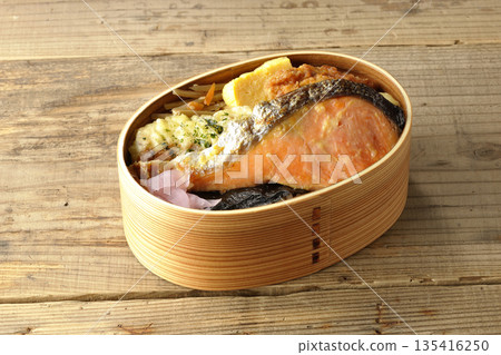 Chikuwa tempura, fried chicken, grilled salmon, and nori bento 135416250