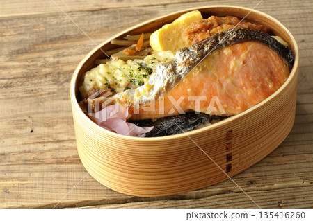 Chikuwa tempura, fried chicken, grilled salmon, and nori bento 135416260