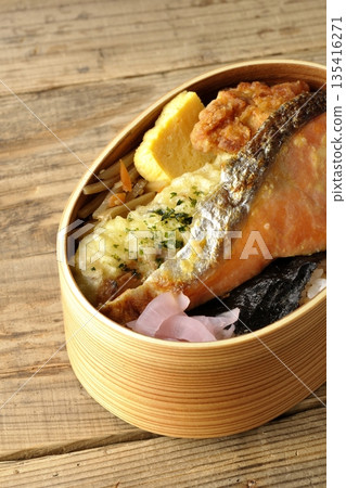 Chikuwa tempura, fried chicken, grilled salmon, and nori bento Chikuwa tempura, fried chicken, grilled salmon, and nori bento 135416271