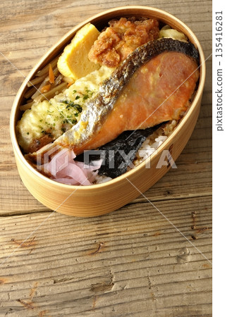 Chikuwa tempura, fried chicken, grilled salmon, and nori bento 135416281