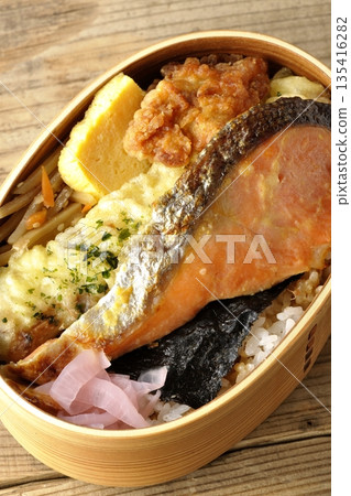 Chikuwa tempura, fried chicken, grilled salmon, and nori bento Chikuwa tempura, fried chicken, grilled salmon, and nori bento 135416282