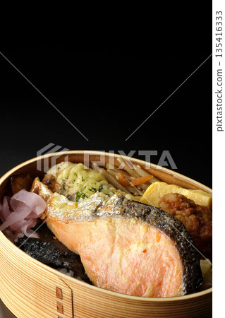 Chikuwa tempura, fried chicken, grilled salmon, and nori bento 135416333