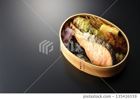 Chikuwa tempura, fried chicken, grilled salmon, and nori bento Chikuwa tempura, fried chicken, grilled salmon, and nori bento 135416339