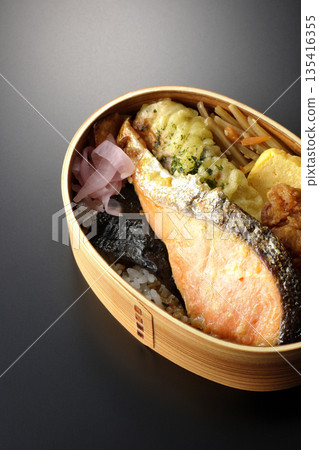 Chikuwa tempura, fried chicken, grilled salmon, and nori bento 135416355