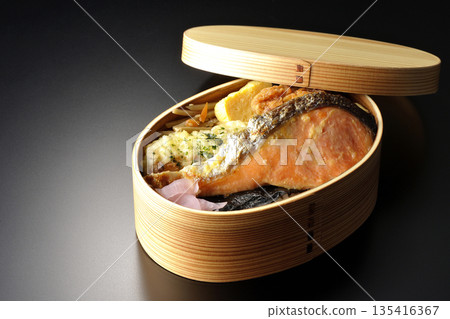 Chikuwa tempura, fried chicken, grilled salmon, and nori bento 135416367