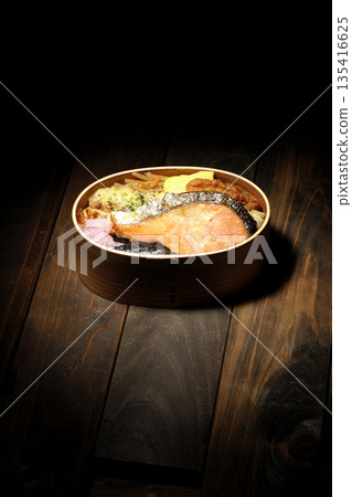 Chikuwa tempura, fried chicken, grilled salmon, and nori bento 135416625