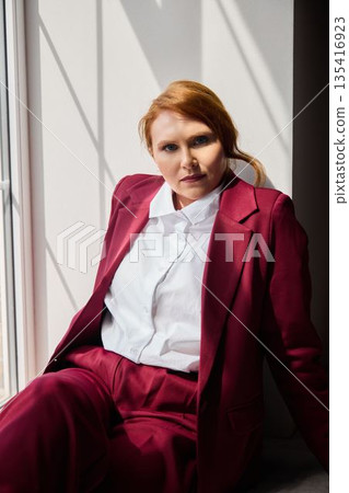 Woman consultant portrait with dramatic light 135416923