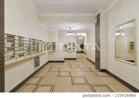 modern apartment lobby with mailboxes and polished tiles modern apartment lobby with mailboxes and polished tiles 135416960