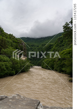 Chorukh River in Georgia View from the bridge to the river between the mountains 135417295