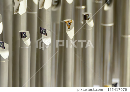 Close Up of CNC Lathe Cutting Tools for Precision Turning Process Close Up of CNC Lathe Cutting Tools for Precision Turning Process 135417976