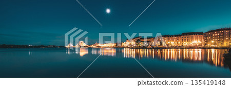 Helsinki, Finland. View Of Police Harbor Merikasarmin Laituri And Laivastokatu Street In Evening Night Illuminations 135419148