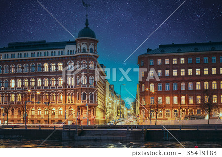Helsinki, Finland. Crossroad Of Pohjoisranta And Kirkkokatu Street In Evening Or Night Illumination. Night stars shining above street 135419183
