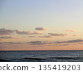 Sunset sky and calm seascape 135419203
